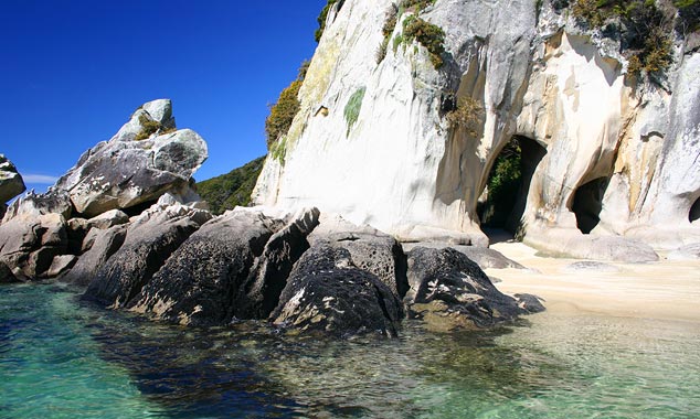The coastline is full of caves to explore.