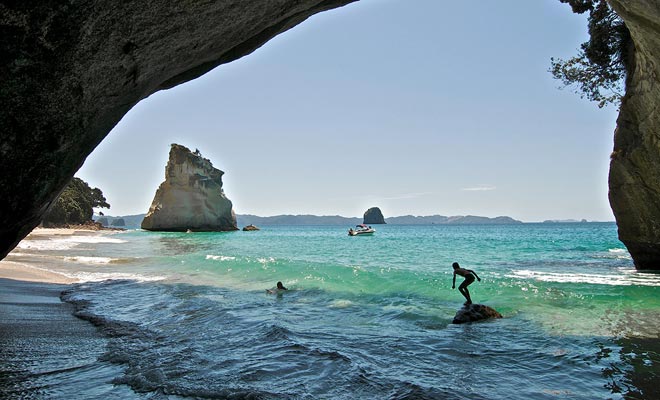The beach at Cathedral Cove is easily accessible by foot or by kayak. It is a few kilometers from Hahei and Hot Water Beach.