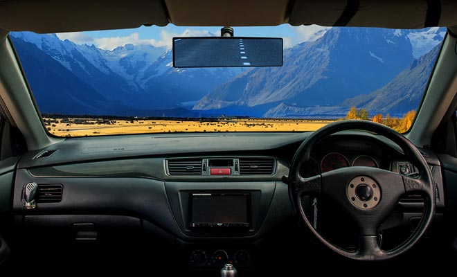 Driving on the left involves cars with steering wheels on the right. One get used to it very quickly as long as priority remains on the right.