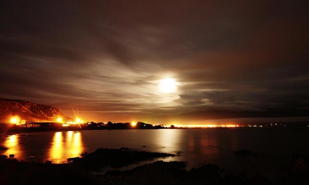 The distant lights remind us how small the village is.