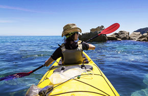 Exploring the Abel Tasman Park with a kayak.