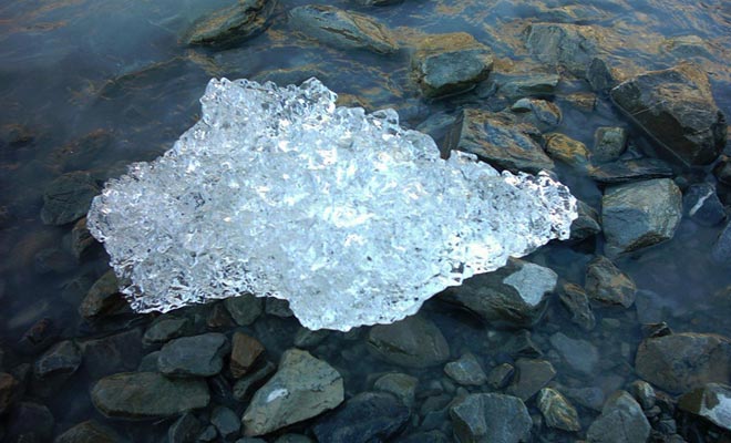 Ice crystals float on the surface of the Tasman Glacial Lake. You can bring back one as a souvenir if you want...