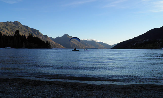 Tandem monitors are able to land exactly where they want. During their training, these seasoned professionals practice landing on a small floating platform on Lake Wakatipu in Queenstown.