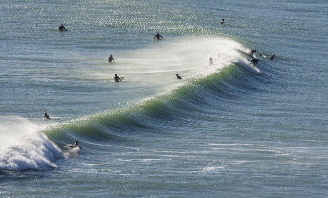 Dunedin's Saint Clair Beach on the South Island is undoubtedly the best beach in New Zealand for surfing.