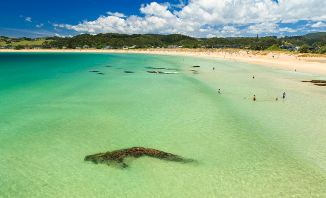 Crescent shaped, and with its crystal clear water, Matapouri Bay beach is one of the most beautiful in New Zealand. You can swim there during the summer months.